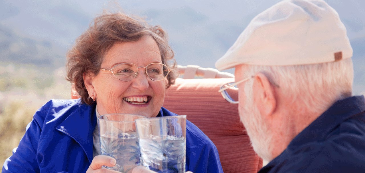 Senior couple drinking water