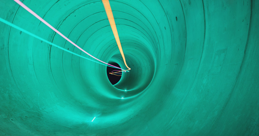 Tideway tunnel in green with neon lights
