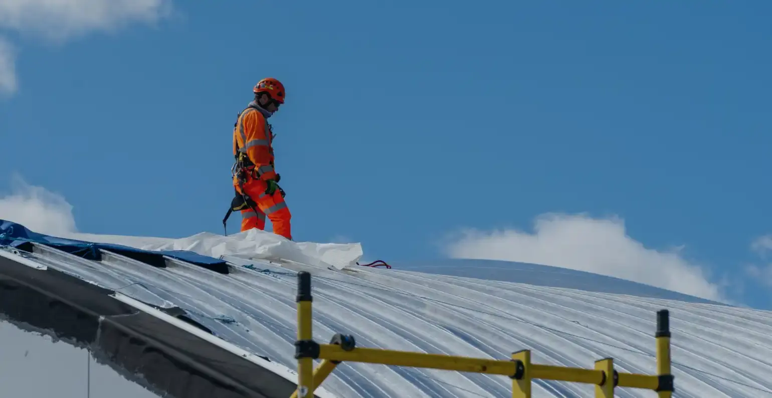 Image 1 - Man on roof (1)